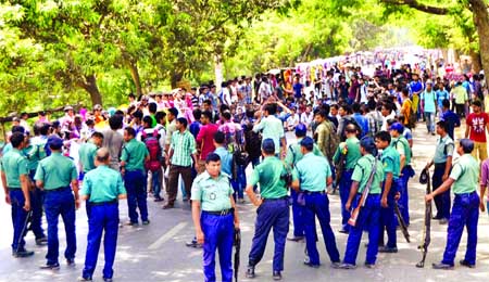 Protesting killing of Prof Rezaul Karim Siddique students of Rajshahi University blocked the Dhaka-Rajshahi Highway on Tuesday.