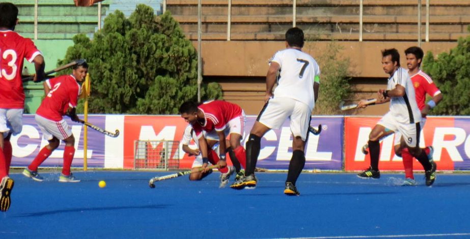 A moment of the match of the Marcel Club Cup Hockey Competition between Dhaka Mohammedan Sporting Club Limited and Wari Club at the Moulana Bhashani National Hockey Stadium on Wednesday.