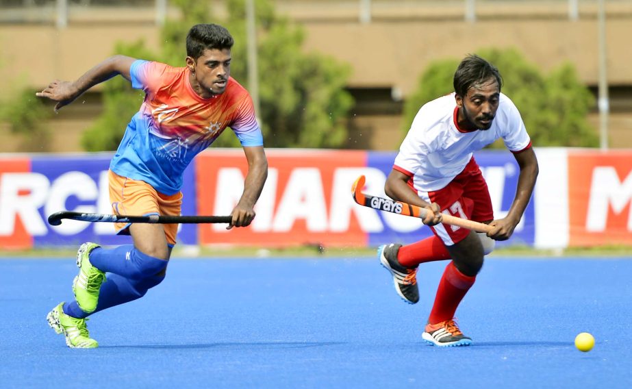 A view of the match of the Marcel Club Cup Hockey Competition between Usha Krira Chakra and Sadharan Bima Krira Sangha at the Moulana Bhashani National Hockey Stadium on Thursday.