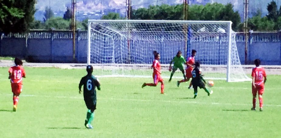 A scene from the football match of the AFC Under-14 Girls' Regional Championship between Bangladesh Under-14 Girls' Football team and Nepal Under-14 Girls' Football team at the Aviator Stadium in Dushanbe, Tajikistan on Thursday.