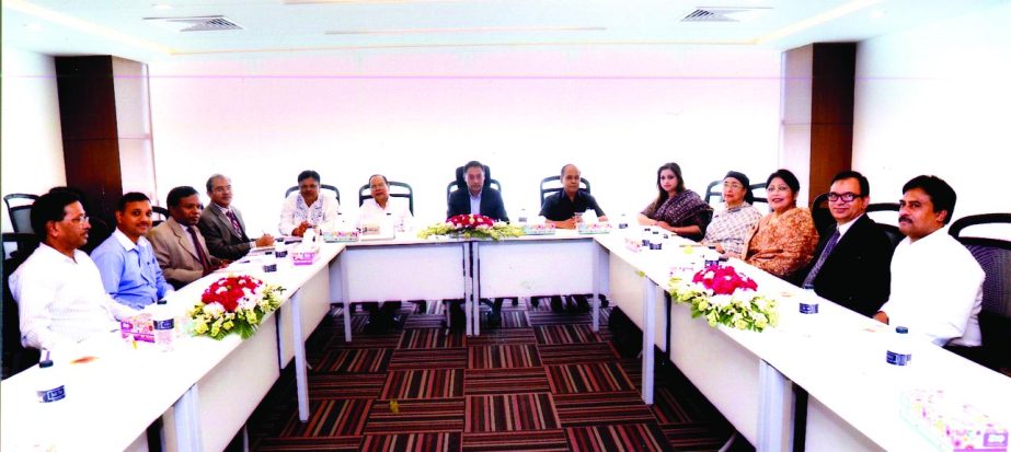 Abdullah Al-Mahmud (Mahin), Chairman of Crystal Insurance Company Limited, presides over its 69th board meeting at the company's corporate office in the city recently. AHM Mozammel Hoque, Tajul Islam, Shazadi Begum and Farhana Nasrin, among others, were