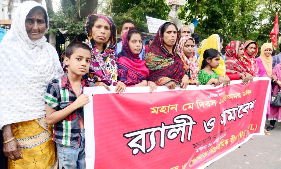 . 'Bangladesh Bastra O Poshak Shilpa Sramik League' organized a rally in front of Jatiya Press Club on Saturday on the occasion of historic May Day.