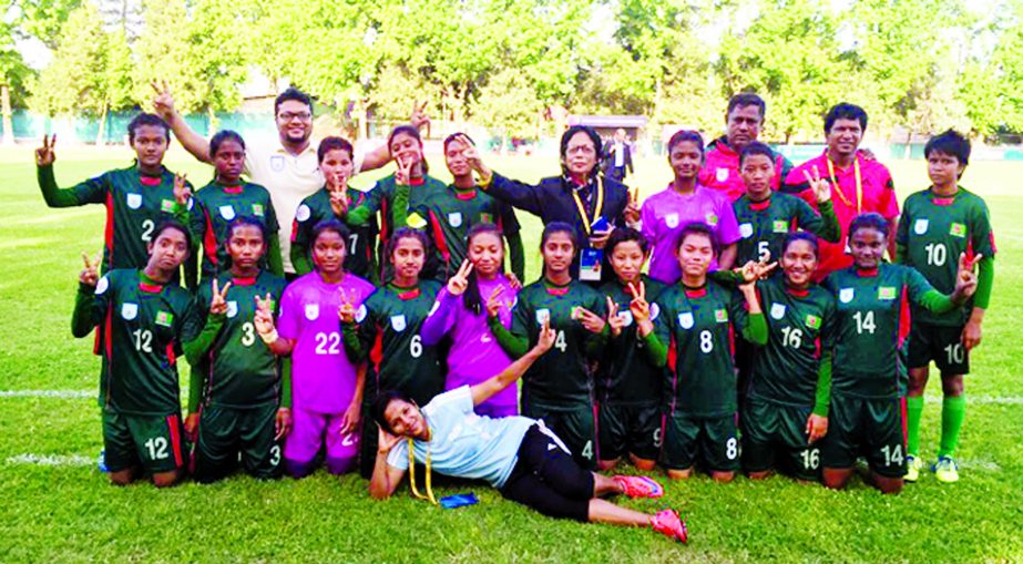 Members of Bangladesh Under-14 Girls' Football team pose for photograph after defeating Tajikistan Under-14 Girls' Football team by 9-1 goals in the semi-final of the AFC Under-14 Girls' Regional Championship at the Aviator Stadium in Dushanbe, Tajikis