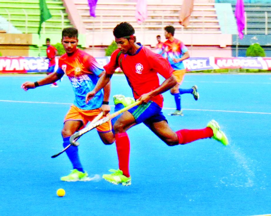 A view of the match of the Marcel Club Cup Hockey between Usha Krira Chakra and Dhaka Mariner Youngs Club at the Moulana Bhashani National Hockey Stadium on Saturday.
