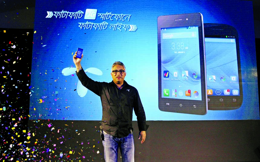 Grameenphone launches new LAVA brand smartphones in the market. A high official of GP poses with the new handsets at a city hotel on Monday.