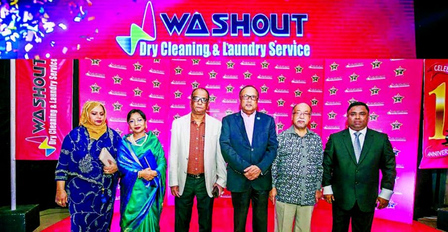 Deputy Minister for the Ministry of Water Resources, Md Nazrul Islam Hiru poses with other guests at the 1st year ending celebration programme of WASHOUT, a local dry wash company at a city hotel recently.