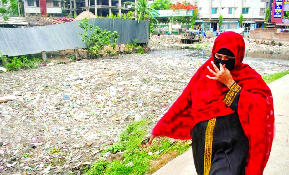 Due to absence of cleanliness drive and illegal dumping of household wastes canals in city's Mohammadpur Housing Society area became a threat to public health. This photo was taken on Tuesday.