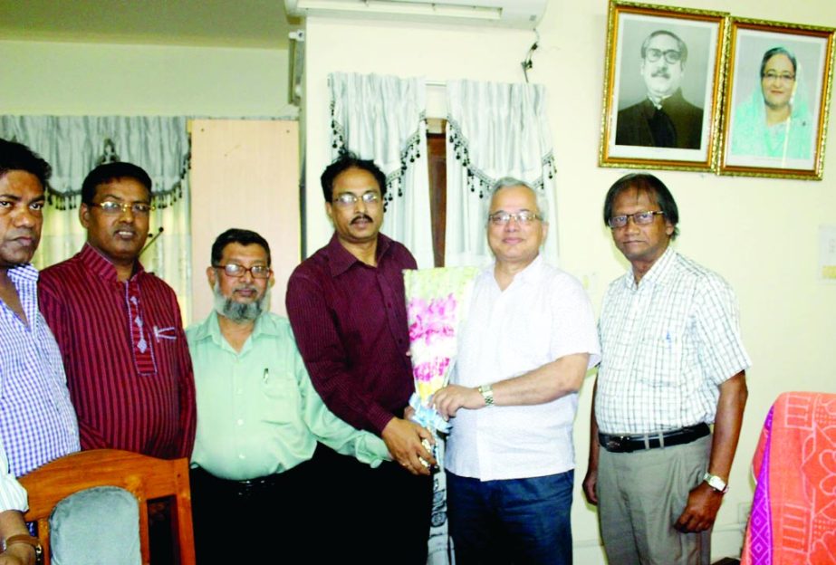 TRIshal (Mymensingh): Reinstated Registrar Aminul Islam is being greeted by Prof Dr Mohit ul Alam, VC, Jatiya Kabi Kazi Nazrul Islam University at a ceremony at his office recently.