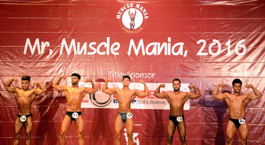 The bodybuilders perform during the selection phase of ' The Muscle Mania' at the Auditorium of National Sports Council Tower on Thursday.