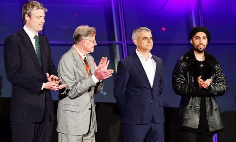 Newly elected London Mayor Sadiq Khan, (2nd R) congratulated by other candidates including Conservative Party candidate Zac Goldsmith (L) following his election victory at City Hall in Central London on Saturday.
