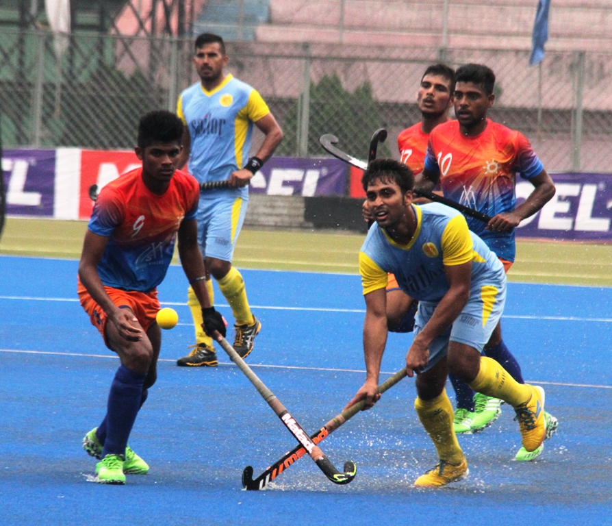 A moment of the semi-final match of the Marcel Club Cup Hockey between Dhaka Abahani Limited and Dhaka Mariner Youngs Club at the Moulana Bhashani National Hockey Stadium on Saturday.