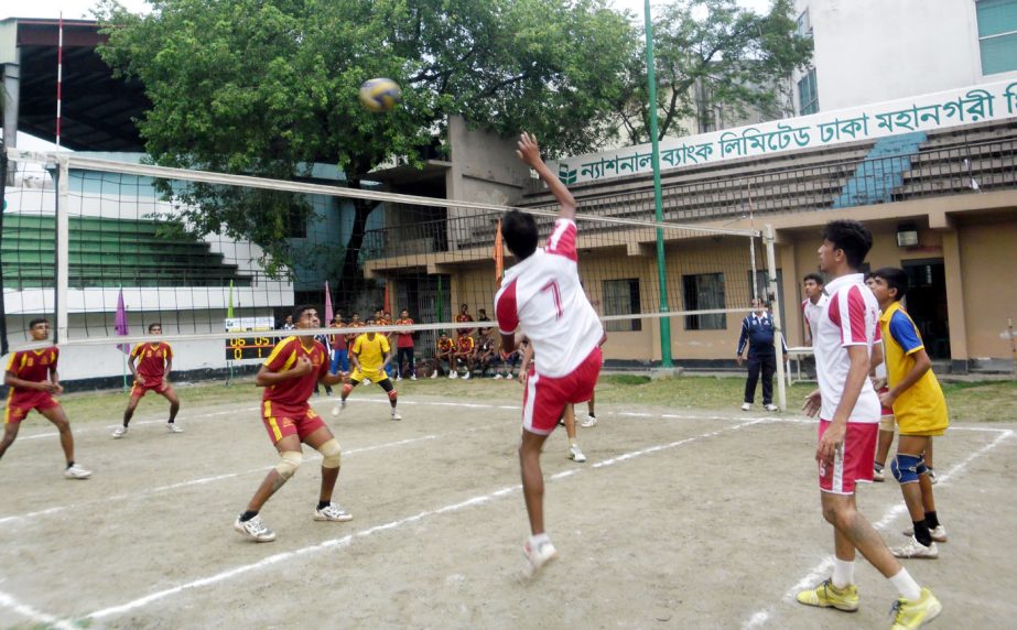 A scene from the match of the National Bank Dhaka Metropolis Premier Division Volleyball League between Border Guard Bangladesh and East End Boys Club at the Dhaka Volleyball Stadium on Saturday.