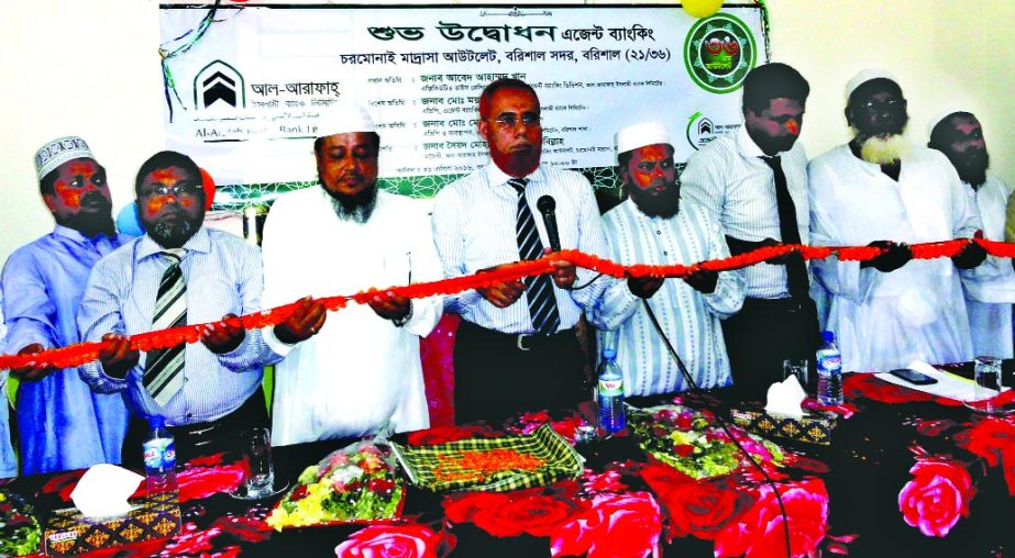 Executive Vice President and Head of Agent Banking Division of Al-Arafah Islami Bank Limited Abed Ahmed Khan inaugurating its Agent Banking Outlet at Charmonai Madrasa Barisal recently.