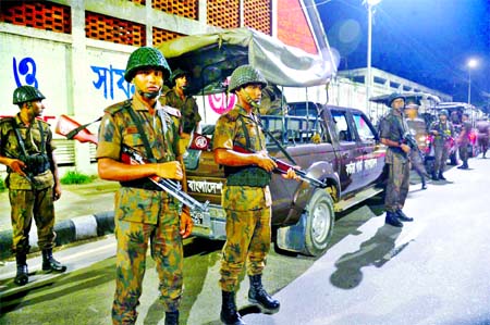 BGB members guarding the Dhaka city streets as part of security steps centering execution of war-crime convict Motiur Rahman Nizami on Tuesday night.