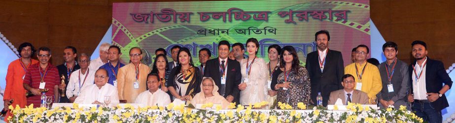 Prime Minister Sheikh Hasina along with the winners of the National Film Awards 2014 at the award giving ceremony at Bangabandhu International Conference Centre in the city on Wednesday. PID