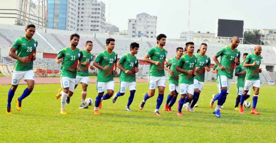 The members of Bangladesh National Football team during their practice session at the Bangabandhu National Stadium on Wednesday.