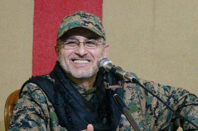 Photo shows slain top Hezbollah military commander Mustafa Badreddine smiling during a meeting.