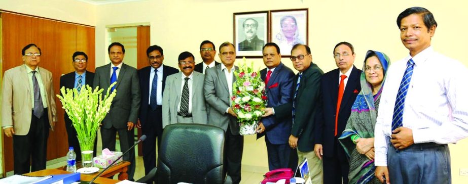 Shaikh Md. Wahid-uz-Zaman, Chairman of Janata Bank Limited Congratulates Masih Malik Chowdhury, FCA newly appointed as a director of JBL on behalf of The Board of Directors on Tuesday. Md. Emdadul Hoque, A.K.M Kamrul Islam, FCA, Md. Mahabubur Rahman Hiron