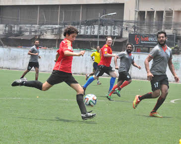 A moment of the friendly football match between Bangladesh Sports Press Association and Spain Embassy at the BFF Artificial Turf on Saturday. Spain Embassy won the match 5-4.