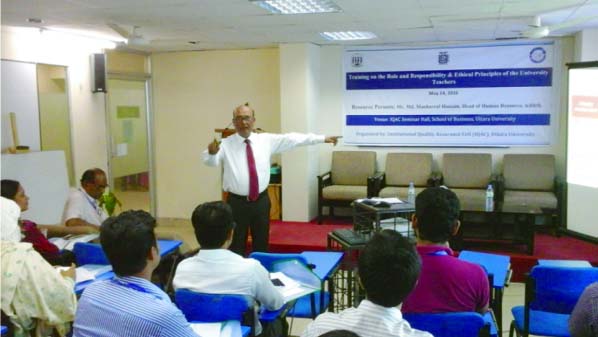 A view of the seminar on ethics of the university teachers at Uttara University on Saturday.