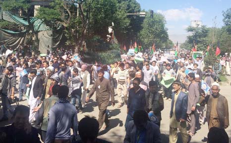Crowds gather on the street in Kabul, Afghanistan for a massive anti-government protest on Monday.