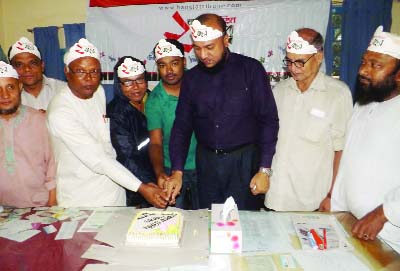 THAKURGAON: AFM Fazlay Rabbi, DC, Thakurgaon cutting cake on the occasion of the second founding anniversary of the online newspaper Bangla Tribune.com on Saturday.