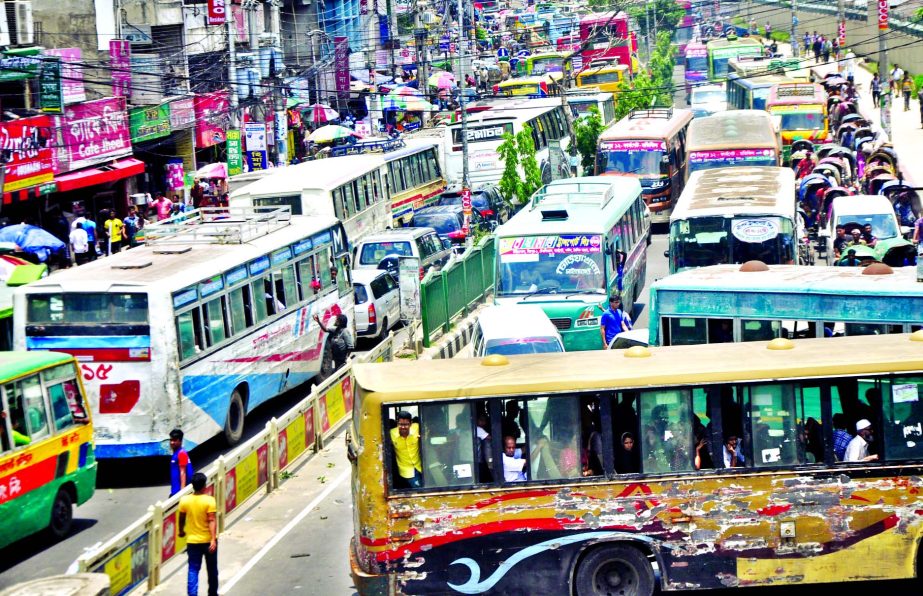 City witnesses huge traffic gridlock as continued rally, sit-in demonstration in front of the Jatiya Press Club blocked the road causing sufferings to commuters on Monday.
