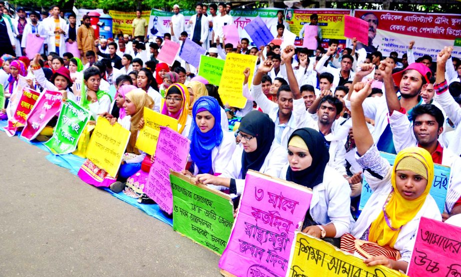 Medical Assistant Training School students and professional diploma doctors observe token hunger strike in front of the Jatiya Press Club demanding implementation of five points on Monday.