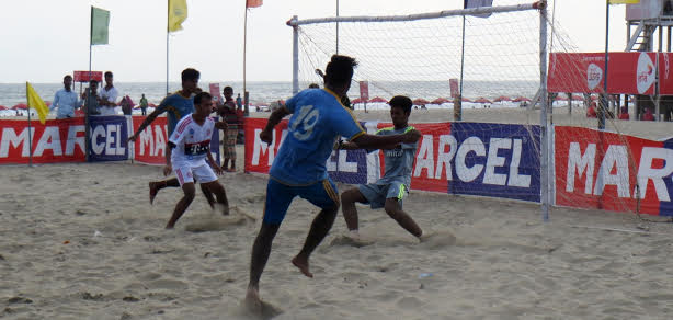 A view of the semi-final match of the Walton 3rd Cox's Bazar Beach Football Tournament between Cox's Bazar Abahani and Youngmens Club at the Laboni Point in Cox's Bazar Sea Beach on Tuesday.