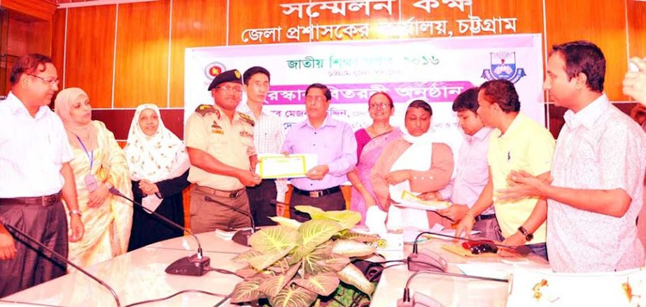 Mesbahuddin, DC, Chittagong distributing prizes marking the National Education Week-2016 at district administration conference hall as Chief Guest on Tuesday.