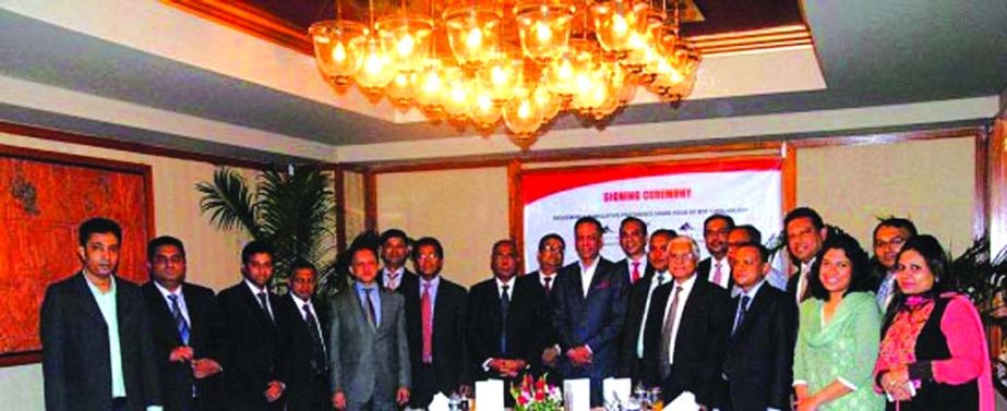 Vice Chairman of Summit Power Limited, Md. Latif Khan, and CEO and Managing Director of NDB Capital Limited, Kanti Kumar Saha pose with representatives of the investors after signing Tk I b agreement for two power plant of Summit Group.