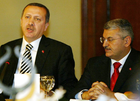 Turkish leader Recep Tayyip Erdogan (left) and Binali Yildirim attend at the Dolmabahce Palace in Istanbul