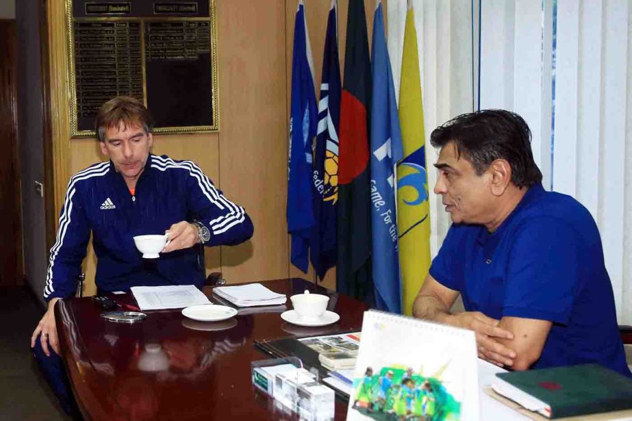 President of Bangladesh Football Federation Kazi Salahuddin talking to Coach of Bangladesh National Football team Lodewijk de Kruif at the BFF House on Saturday.