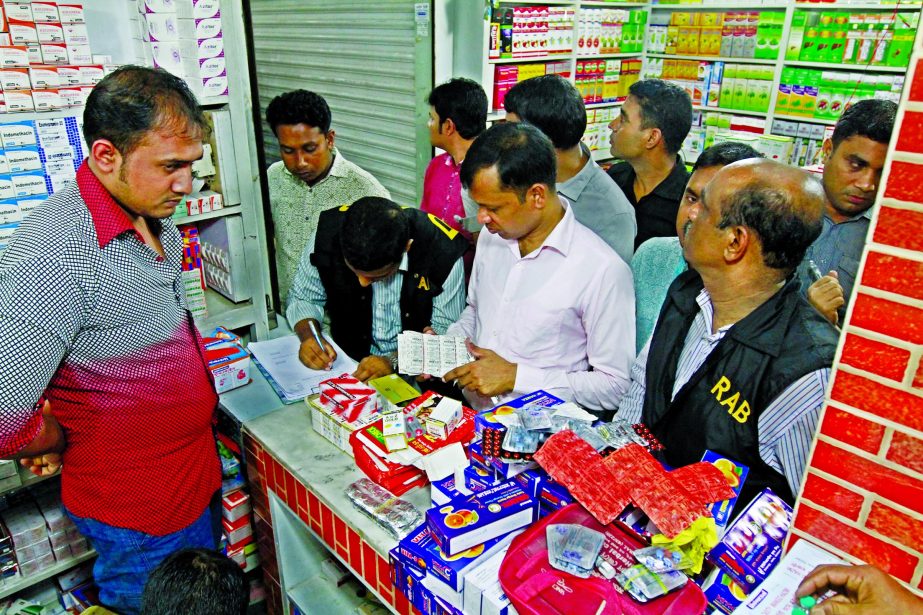 RAB-10 mobile team led by a magistrate raided medicine shops at Mitford Road sent three persons in jail and fined six lakh taka for selling spurious and forged drugs on Saturday.