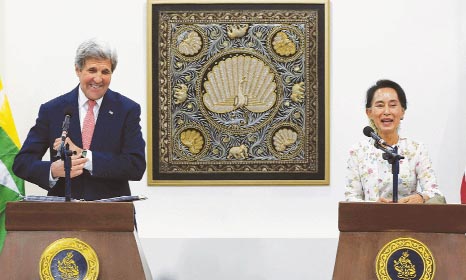US Secretary of State John Kerry and Myanmar's Aung San Suu Kyi addressing a press conference in Naypyidaw on Sunday.
