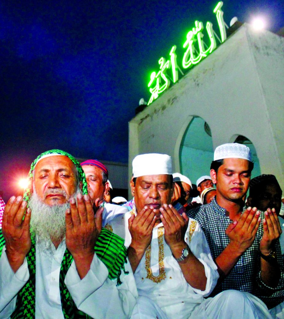 Marking the holy Shab-e-Barat devotees offering Munajat at the Baitul Mukarram National Mosque on Sunday night.