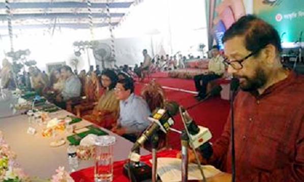 Minister for Cultural Affairs Asaduzzaman Noor addressing a discussion meeting marking the 117th birth anniversary of the National Poet Kazi Nazrul Islam at Chittagong outer stadium as chief guest on Tuesday.