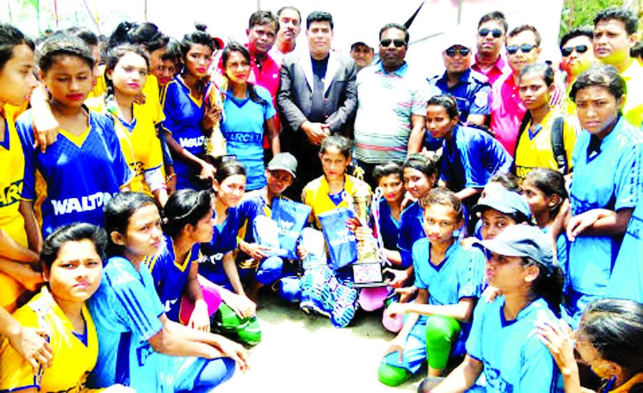 Tatiny team and Tanmay team, the champions and the runners-up of the Walton 1st Women's Beach Football Tournament with the guests and the officials of Cox's Bazaar Disrtrict Sports Association pose for a photo session at the Laboni Point in Cox's Baza