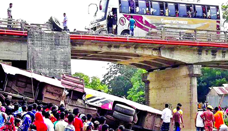 Nine passengers were killed when a bus plunged into a roadside ditch at Samaddar in Madaripur Sadar Upazila on Friday afternoon.