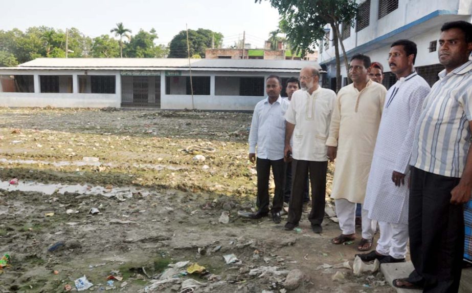 Professor Nisar Uddin Ahmed Monju, Acting Mayor of CCC visiting development works of playground of Halisahar B- Block Housing Estate High School on Saturday.