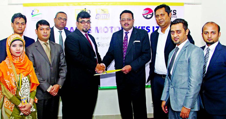 M. Nazeem A. Choudhury, Head of Consumer Banking of Eastern Bank Ltd. (EBL) and Dileep Banerjee, CEO of Ranks Motorbikes Ltd. exchanging documents after signing a Zero Percent Installment Plan (ZIP) agreement in Dhaka recently.Under the agreement EBL Card