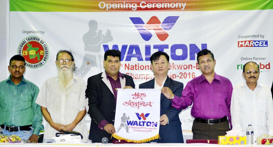 Chief the Mission of North Korean Embassy in Bangladesh Hun Son inaugurating the Walton 8th National Taekwondo Competition as the chief guest at the Gymnasium of National Sports Council on Sunday.