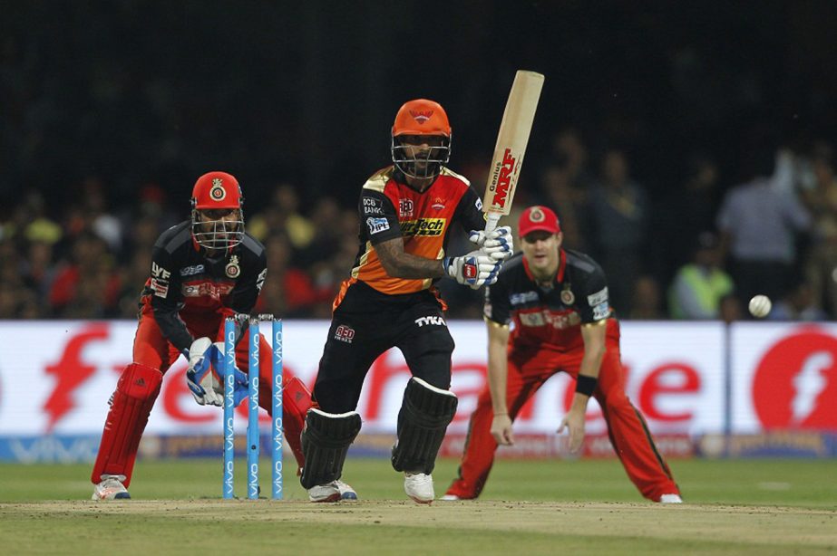 Shikhar Dhawan drives down the ground during the IPL 2016 final match between Royal Challengers Bangalore and Sunrisers Hyderabad at Bangalore on Sunday.