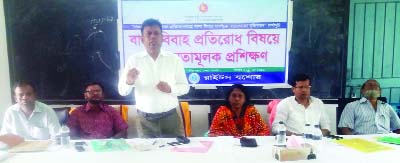MONIRAMPUR(Jessore): Kamrul Hasan, UNO, Monirampur Upazila speaking at a training workshop on bad effects of child marriage at Monirampur PG College as Chief Guest on Sunday.