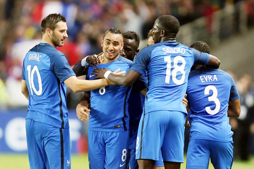 France's Dimitri Payet, second (left) celebrates with teammates after scoring his team's third goal during a friendly soccer match between France and Cameroon at the La Beaujoire Stadium in Nantes, western France on Monday. The French squad is in prepar