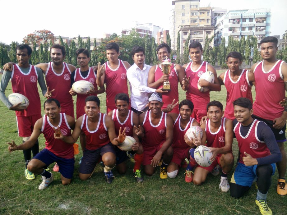 Members of Old DOHS Club, the champions of the Bamboo Castle Club Cup Rugby Competition pose for a photograph at the Physical Education College Ground in Mohammadpur on Wednesday.