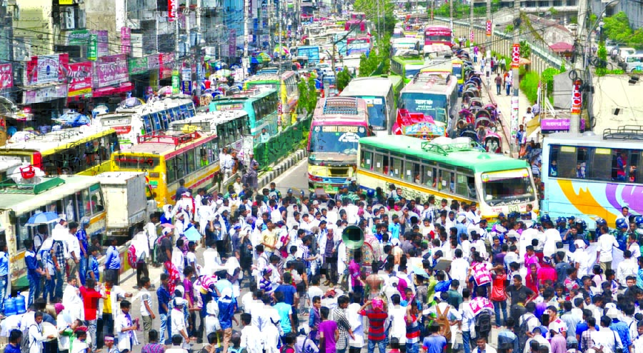 Medical Assistant training school students, bekar and professional Diploma physicians have been demonstrating for 18 days in front of the Jatiya Press Club demanding implementation of their 5-point causing regular traffic jam at Topkhana Road. This photo