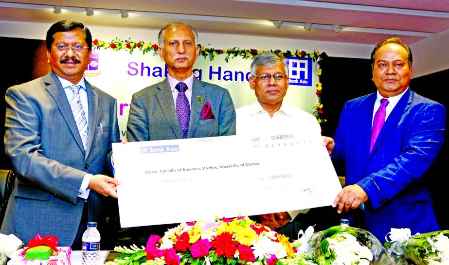 Md Mehmood Husain, Managing Director of Bank Asia Ltd, handing over a cheque of Tk 30 lakh to Prof Shibli Rubayat-Ul-Islam, Dean, Faculty of Business Studies of University of Dhaka for establishing a virtual classroom for the faculty at the university on