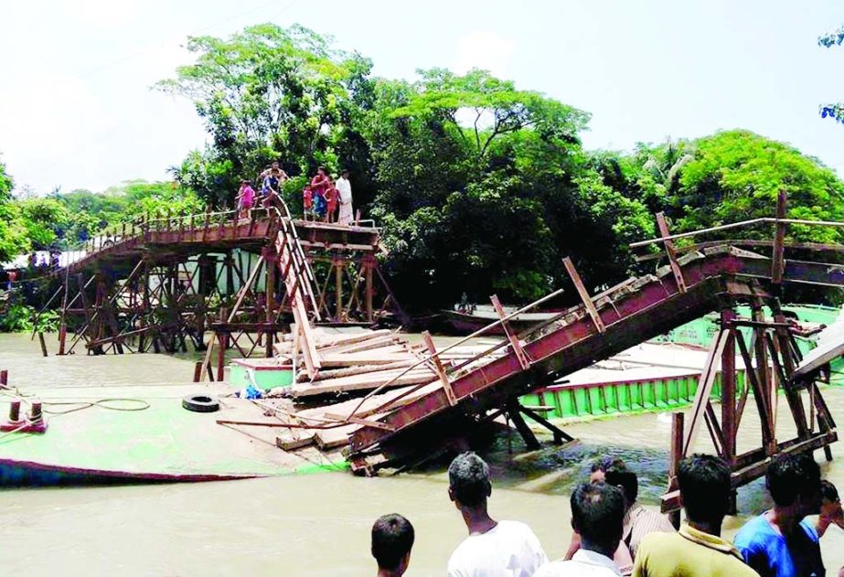 BARISAL: The direct road communication was disrupted as a bridge collapsed due to hit by cargo at Kalaskathi under Bakerganj Upazila . This picture was taken yesterday.