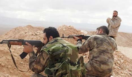 Syrian army forces retake strategic heights in the Raqqa province.